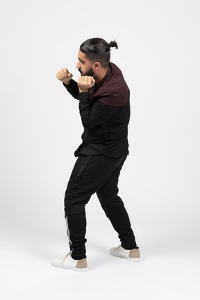 A young man boxing