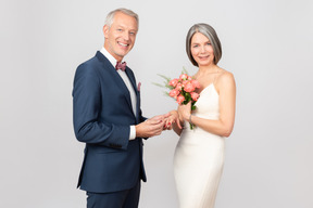 Beautiful middle-aged couple on their wedding day