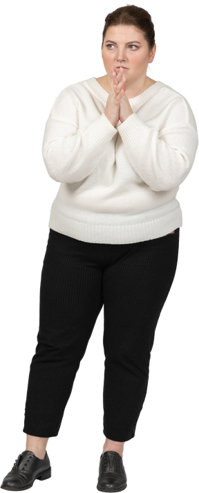Scared plus size woman in casual clothes