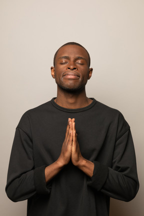 Young man is praying