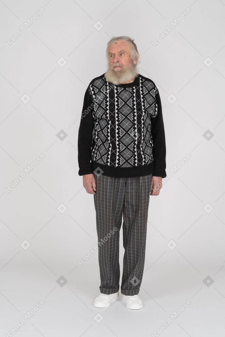 Old man standing with side look