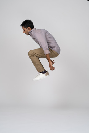 Man in casual clothes jumping