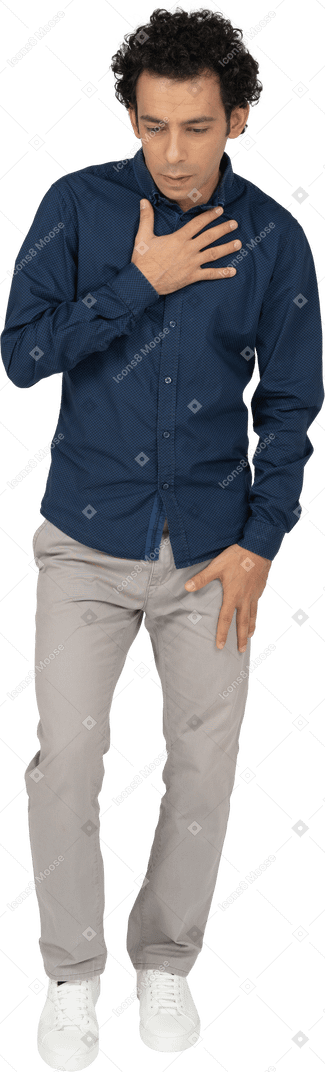 Front view of a man in casual clothes posing