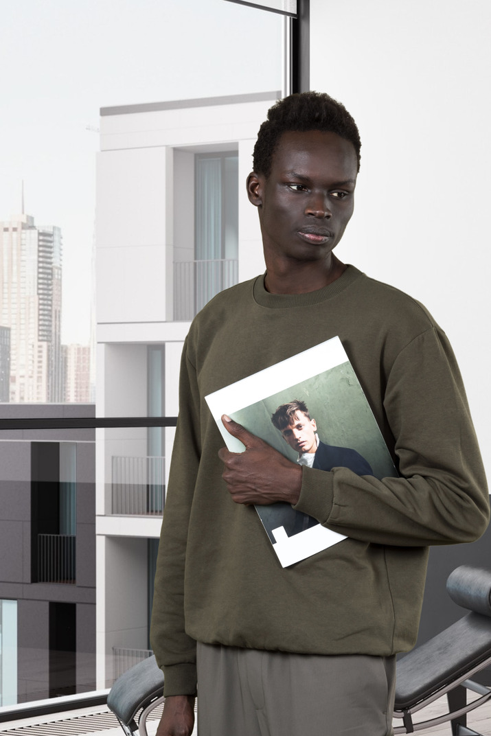Man holding a magazine