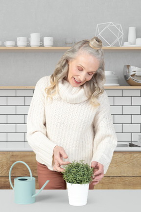 A woman taking care of plant