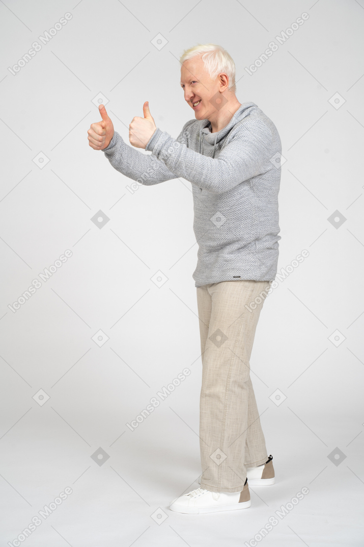 Man giving thumbs up with two hands