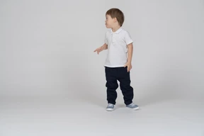 Front view of little child looking aside