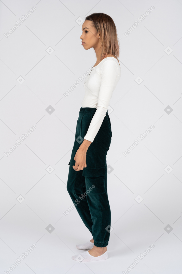 Woman in casual clothes standing