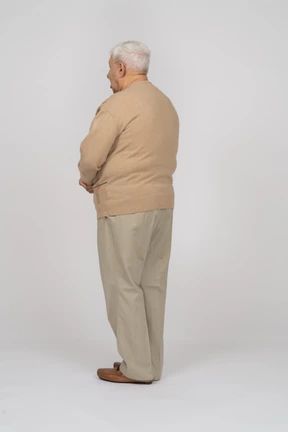 Rear view of an old man in casual clothes