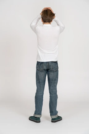 Young man in casual clothes standing