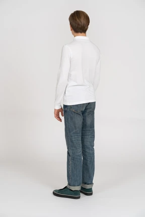 Young man in casual clothes standing