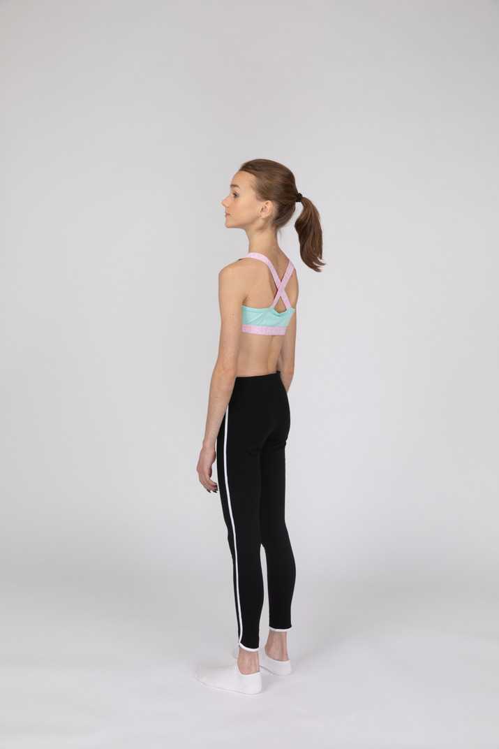Side View Of A Teen Girl In Sportswear Raising Hand And Arguing Photo