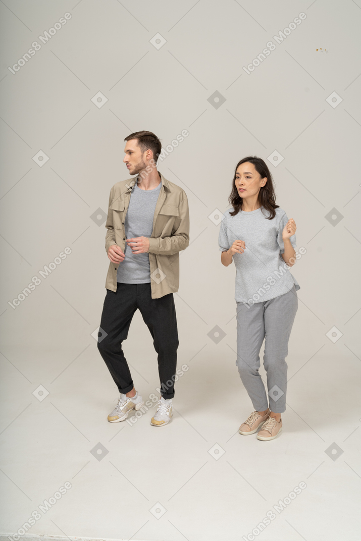 Man and woman practicing their dance moves