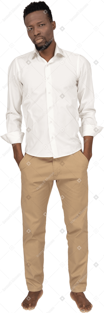 Man in white shirt standing