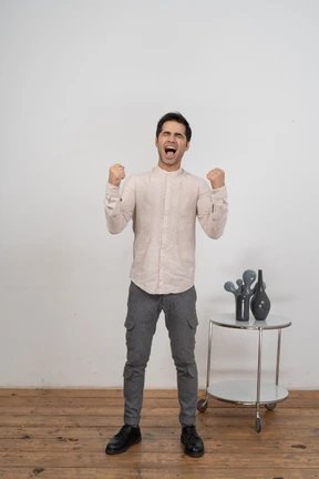 Front view of a happy man in casual clothes