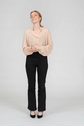 Woman in beautiful blouse standing