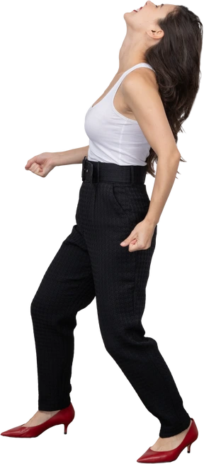 Full-length of a careful young female in office clothing and leaning back
