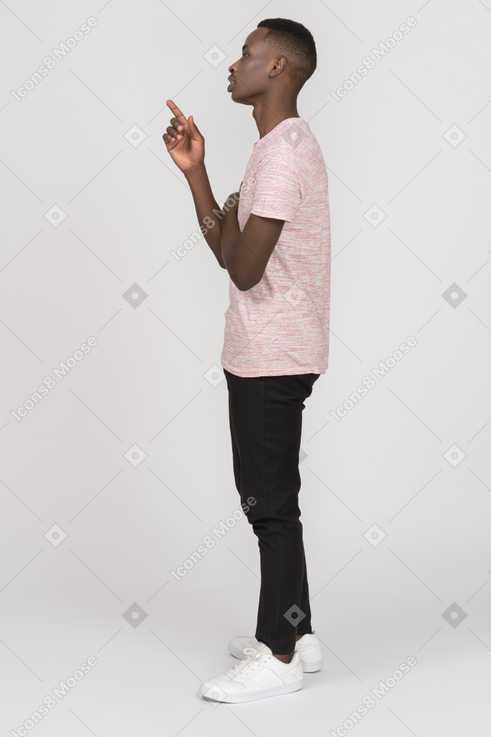 Side view of man explaining something with pointing finger