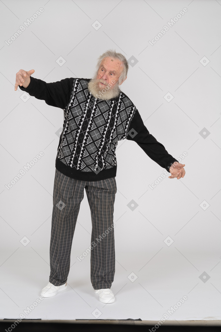 Old man showing big gesture with hands