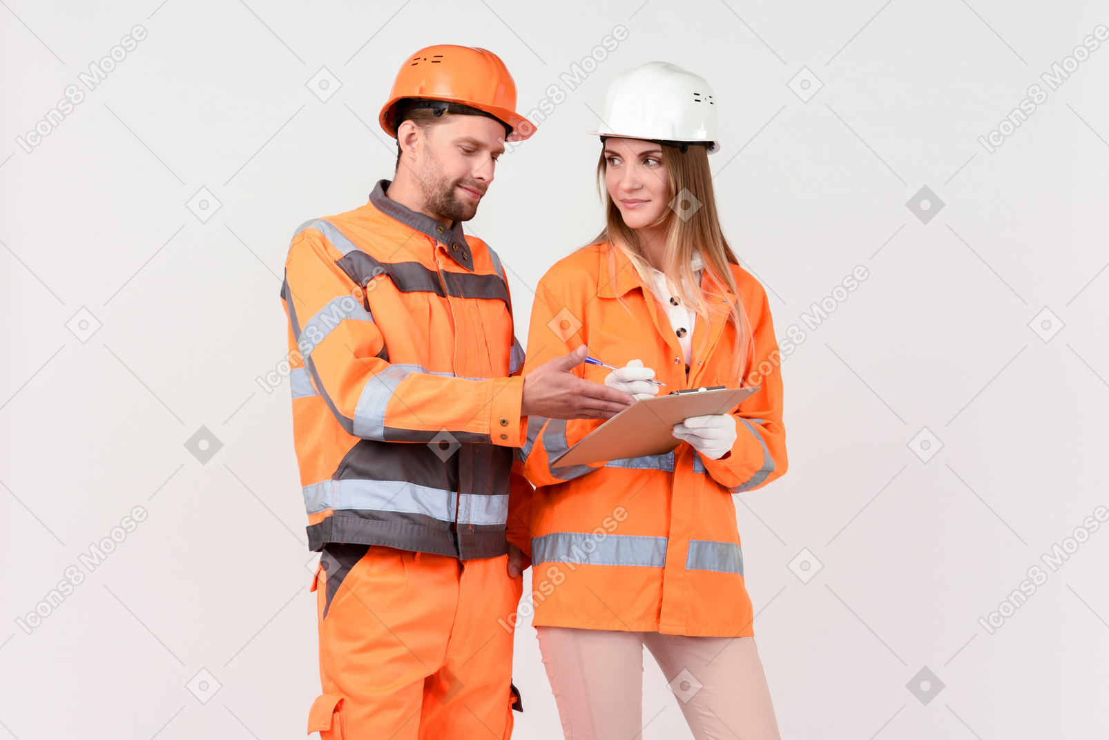 Male and female workers discussing something