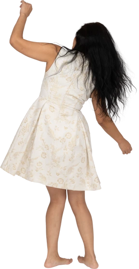 Woman in beautiful dress dancing