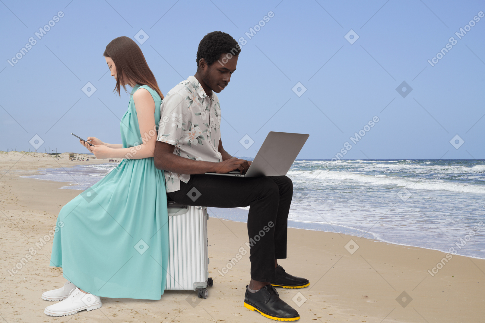 A man and a woman sitting on a suitcase on the beach