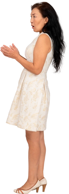 Woman in beautiful dress standing