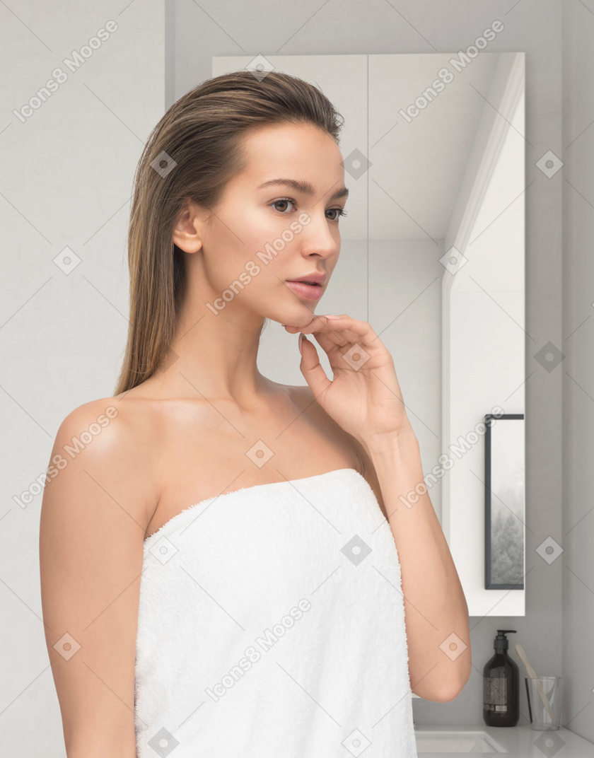 シャワーの後の美しい若い女性