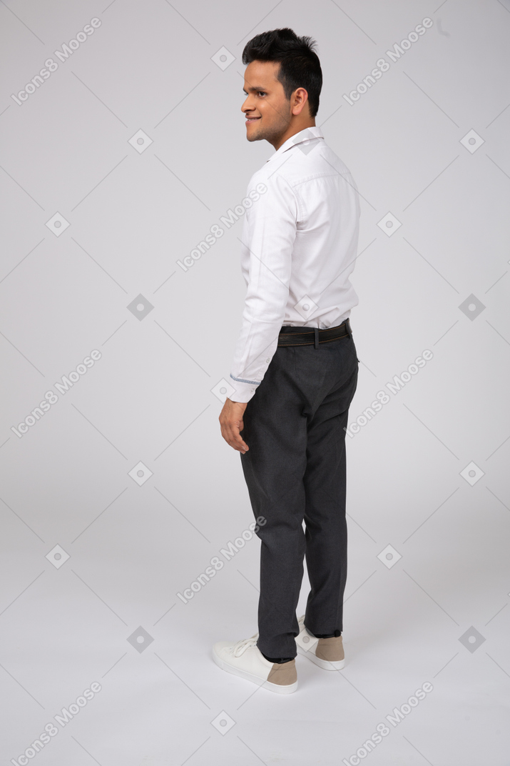 Man in white shirt standing