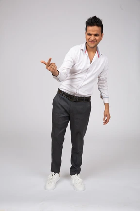 Man in white shirt standing