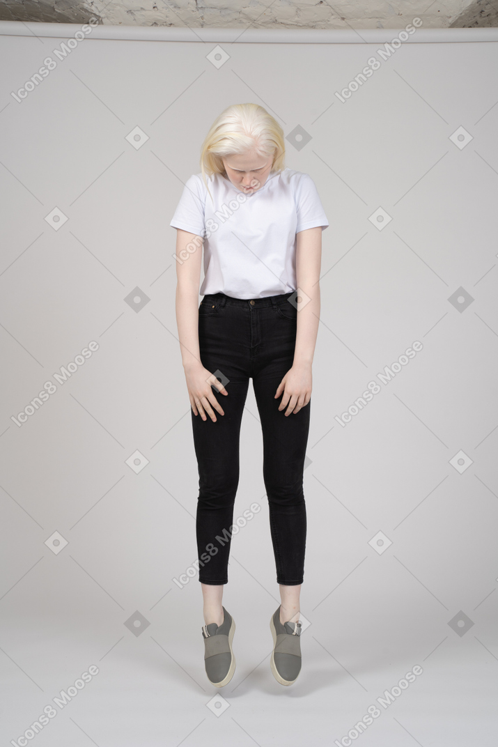 Girl levitating with head down
