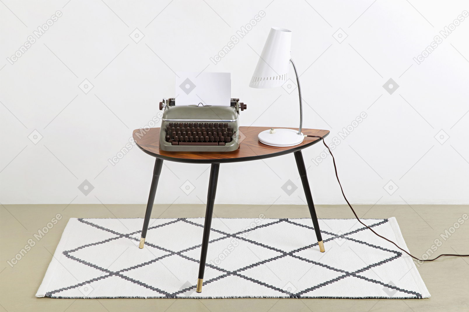 A typewriter and a table lamp on a retro table