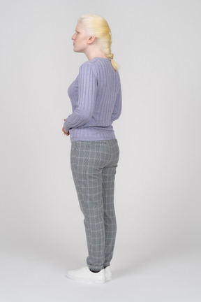 Young woman with braided hair standing