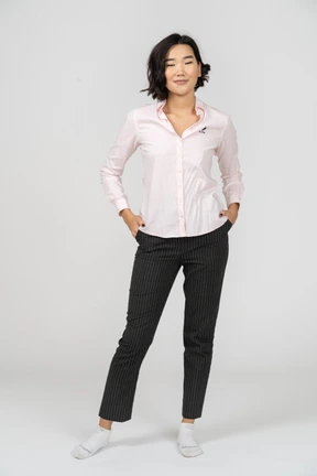 Smiling woman in office clothing with her eyes closed