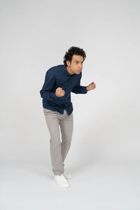 Front view of a man in casual clothes gesturing