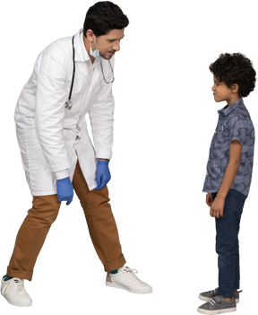 Doctor and boy looking at each other