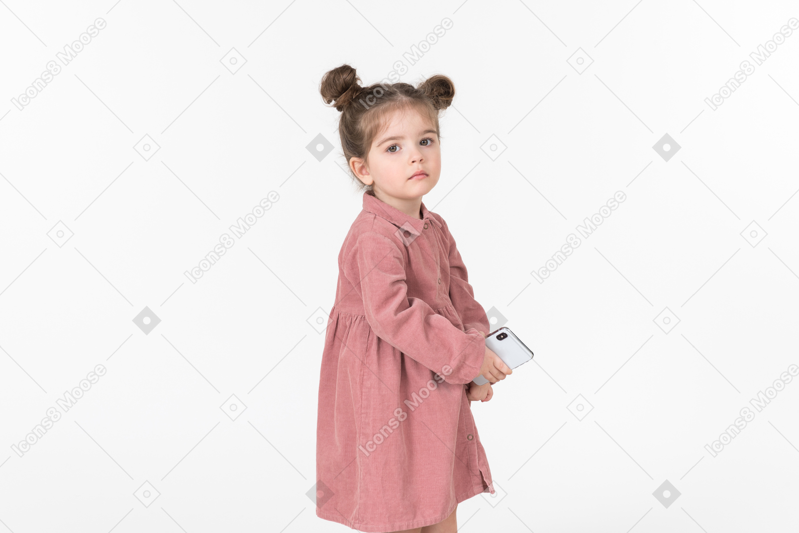Little kid girl holding smartphone