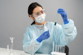 Laboratory worker with tubes