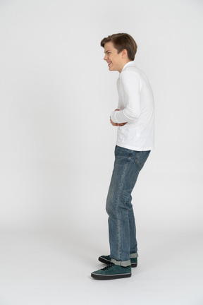 Young man in casual clothes standing