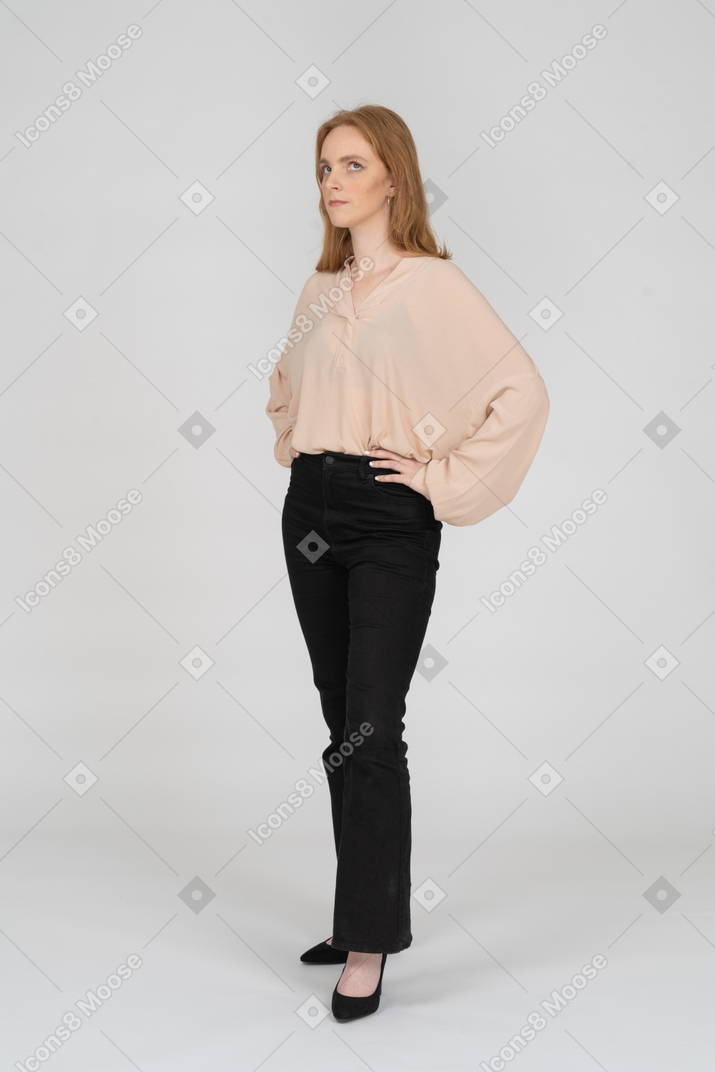 Woman in beautiful blouse standing