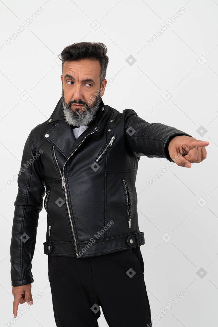 Confident handsome mature man pointing at something