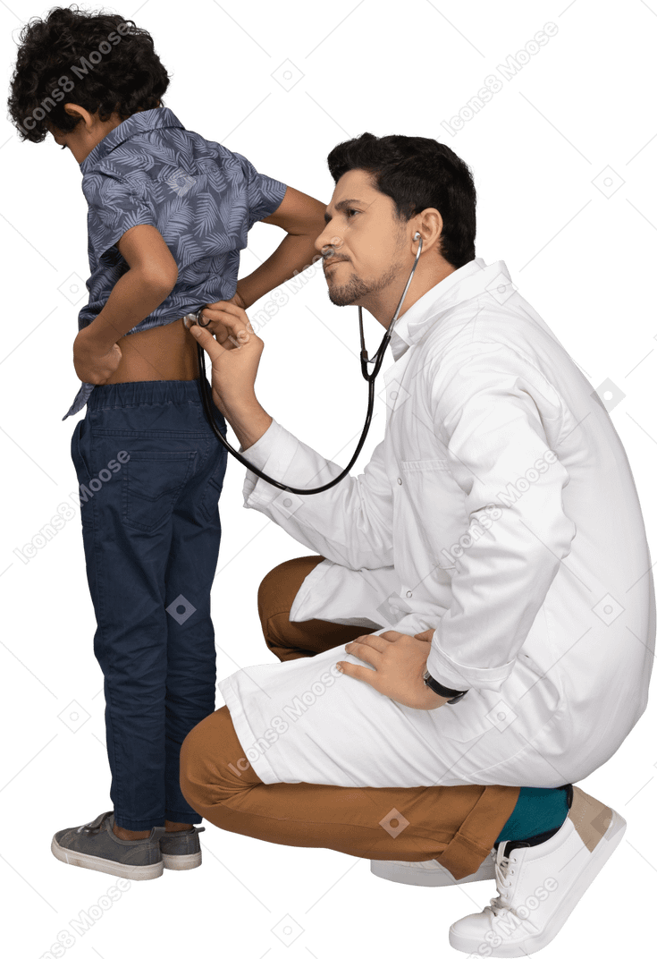Doctor with stethoscope examining a boy