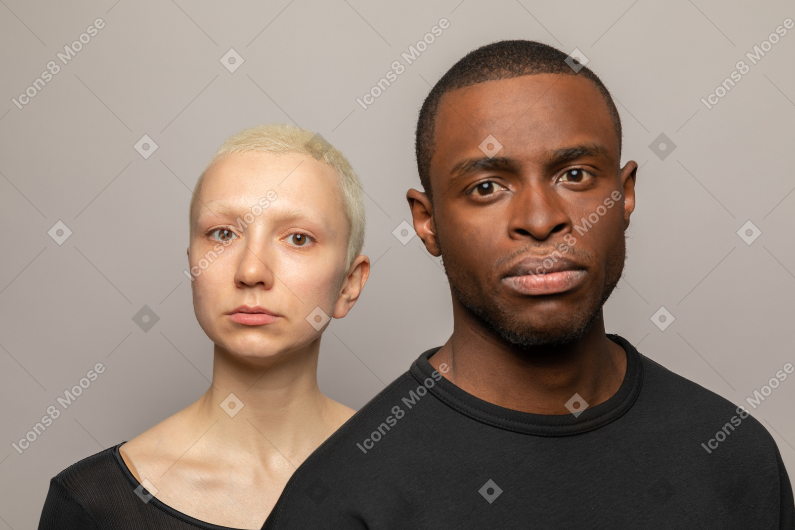 Diverse couple looking at camera