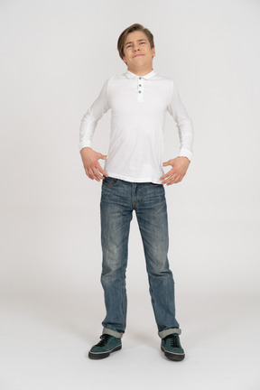 Young man in casual clothes standing