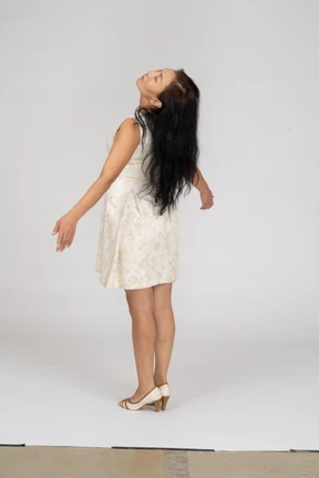 Woman in beautiful dress standing