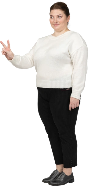 Happy plump woman standing in profile