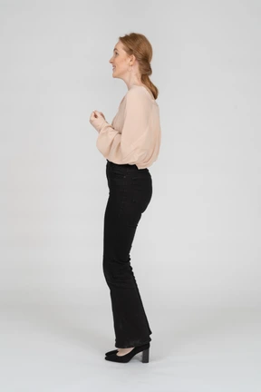Woman in beautiful blouse standing