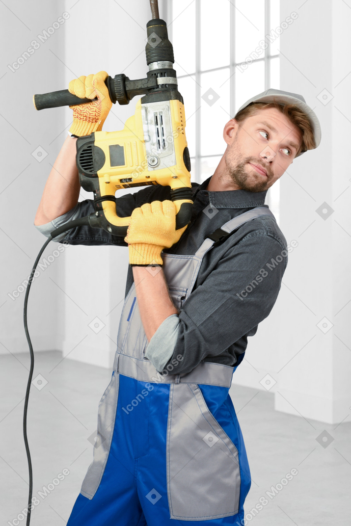 Repairman with drill