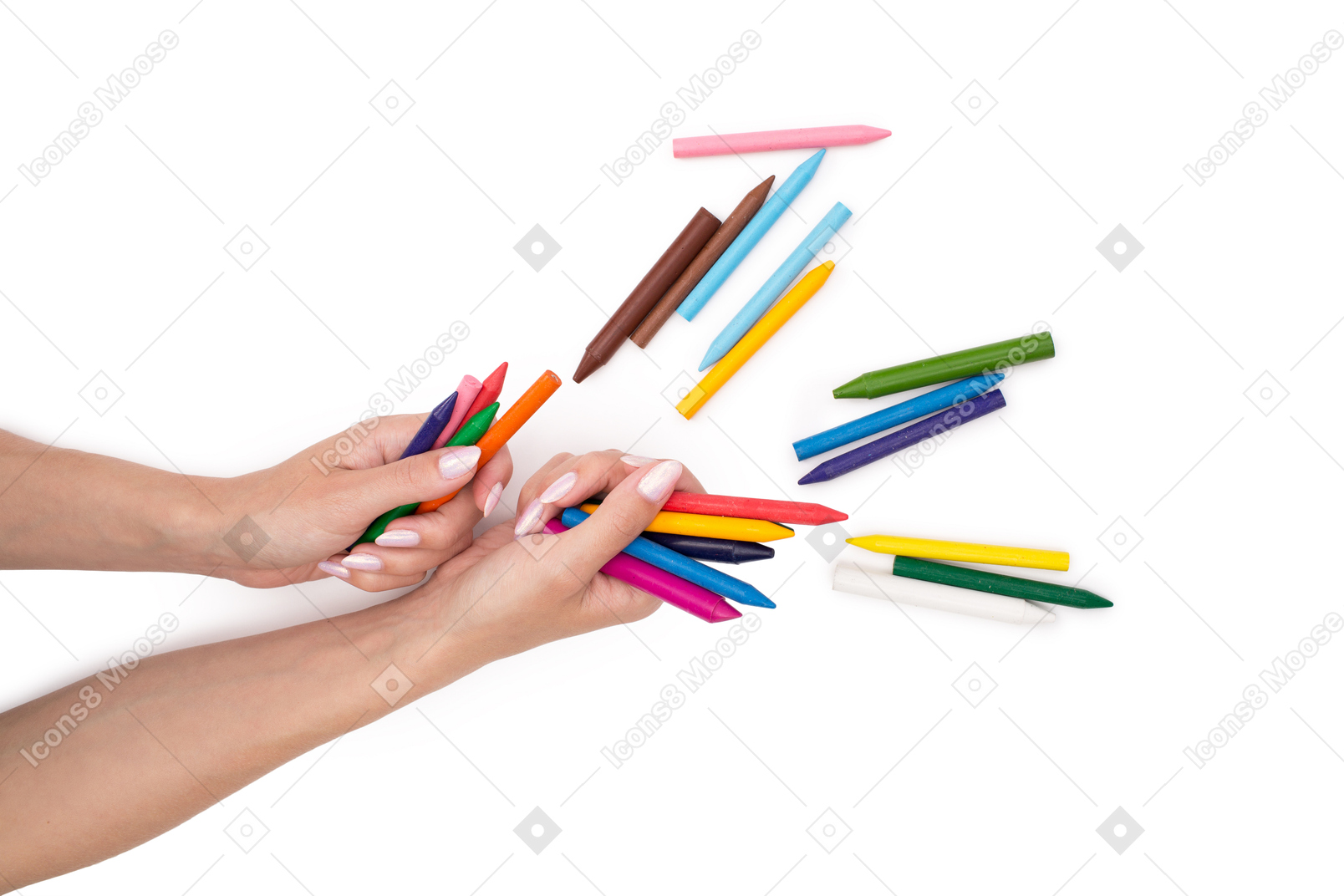 Hands holding multicolored crayons