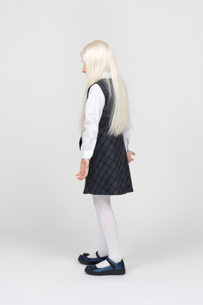 Back view of a schoolgirl with long hair